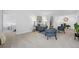 Open living room design, providing a welcoming atmosphere with stylish decor and seamless flow to the bedroom at 7402 S Quail Cir # 1116, Littleton, CO 80127
