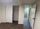 View of bedroom featuring closet, and doorway leading to the stairs at 2000 Irving St, Denver, CO 80211