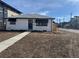 Charming brick home with a newly landscaped front yard and inviting entryway at 2000 Irving St, Denver, CO 80211