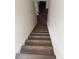 View of newly installed stairs with dark wood finish and white risers at 2000 Irving St, Denver, CO 80211