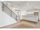 Finished basement with a staircase and a serving counter at 4978 Hickory Oaks St, Castle Rock, CO 80104
