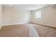Spacious basement featuring neutral carpet, natural light, and a versatile open floor plan at 4978 Hickory Oaks St, Castle Rock, CO 80104
