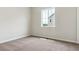 Neutral bedroom featuring plush carpeting, a window, and ample natural light at 4978 Hickory Oaks St, Castle Rock, CO 80104