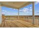 Inviting wooden deck with railings and scenic views of the surrounding neighborhood at 4978 Hickory Oaks St, Castle Rock, CO 80104
