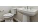 Cozy powder room featuring a modern sink with chrome hardware and a toilet at 4978 Hickory Oaks St, Castle Rock, CO 80104