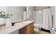 Bathroom featuring vanity, a mirror, vanity and shower with curtain at 3178 Geneva Ct, Denver, CO 80238