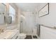 Bathroom showcasing a spacious walk-in shower, elegant vanity, and stylish fixtures creating a serene retreat at 3178 Geneva Ct, Denver, CO 80238