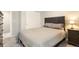 Bedroom featuring a sliding-door closet and a comfortable bed for a peaceful night's sleep at 3178 Geneva Ct, Denver, CO 80238