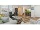 Inviting living room with hardwood floors, comfortable seating, and natural light, creating a relaxing space at 3178 Geneva Ct, Denver, CO 80238