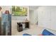 Cozy living room includes mounted television and comfortable seating area at 3178 Geneva Ct, Denver, CO 80238