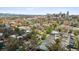 Elevated aerial view showcasing the neighborhood, cityscape and surrounding mature trees in a residential area at 39 S Grant St, Denver, CO 80209