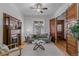 Bright living room with a decorative fireplace, hardwood floors, and natural light at 39 S Grant St, Denver, CO 80209