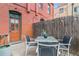 Outdoor patio with table and chairs, perfect for relaxation at 39 S Grant St, Denver, CO 80209