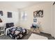 Cheerful bedroom with gaming theme, featuring bright accents and playful decor at 17448 E 103Rd Pl, Commerce City, CO 80022
