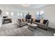 Spacious loft area offering comfortable seating and a functional workspace at 17448 E 103Rd Pl, Commerce City, CO 80022