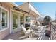 Inviting deck with awning and comfortable seating at 514 Creekside Ct, Golden, CO 80403