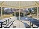 View from inside a gazebo with seating and mountain views beyond at 514 Creekside Ct, Golden, CO 80403