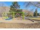 View of playground equipment in a park setting with mountain views at 514 Creekside Ct, Golden, CO 80403