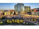 A captivating aerial view showcases Denver's cityscape and vibrant park, offering an urban oasis at 1700 Bassett St # 504, Denver, CO 80202