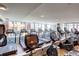 Well-equipped gym with treadmills, elliptical machines, and plenty of natural light at 1700 Bassett St # 504, Denver, CO 80202