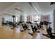 Bright and clean gym featuring stationary bikes and large windows at 1700 Bassett St # 504, Denver, CO 80202