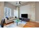 Comfortable living space featuring concrete pillars, a stylish sofa, and large windows, offering a cozy retreat at 1700 Bassett St # 504, Denver, CO 80202
