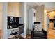 This office nook features a built-in desk, black subway tile backsplash, and black leather chair at 1700 Bassett St # 504, Denver, CO 80202