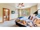 Comfortable bedroom with a ceiling fan, natural light, and mountain views through the window at 200 Rachel Ln, Breckenridge, CO 80424