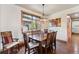 Inviting dining area with natural lighting, wooden furniture, and scenic views at 200 Rachel Ln, Breckenridge, CO 80424
