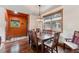 Inviting dining room featuring hardwood floors, modern lighting, and mountain views at 200 Rachel Ln, Breckenridge, CO 80424