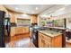 Bright kitchen features wood cabinets, granite counters, modern appliances and hardwood floors throughout at 200 Rachel Ln, Breckenridge, CO 80424