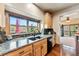 The kitchen has wood cabinets, granite counters, stainless steel appliances, and a lovely view at 200 Rachel Ln, Breckenridge, CO 80424