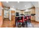 Open kitchen boasts granite countertops, stainless steel appliances, and breakfast bar seating at 200 Rachel Ln, Breckenridge, CO 80424