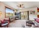 Cozy living room showcasing a stone fireplace, mountain views, and comfortable seating at 200 Rachel Ln, Breckenridge, CO 80424