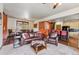 Spacious living room area with hardwood floors, leather seating, and open floor plan at 200 Rachel Ln, Breckenridge, CO 80424