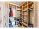 Spacious walk-in closet with custom shelving, hanging rods, and ample storage for clothing and accessories at 200 Rachel Ln, Breckenridge, CO 80424