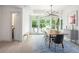 Bright dining area with hardwood floors and modern light fixture at 2456 S Humboldt St, Denver, CO 80210