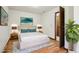 Comfortable bedroom with hardwood floors and modern decor at 10469 Christopher Dr, Conifer, CO 80433