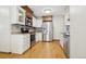 Modern kitchen with stainless steel appliances and ample cabinet space at 10469 Christopher Dr, Conifer, CO 80433