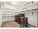 Functional laundry room with built-in shelving and modern appliances at 10469 Christopher Dr, Conifer, CO 80433