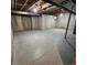 Unfinished basement space with concrete floor, exposed ceiling, and utility access at 2746 S Kenton Ct, Aurora, CO 80014