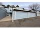 Well-maintained townhome exterior with individual garages and neat landscaping, offering curb appeal and convenience at 2746 S Kenton Ct, Aurora, CO 80014