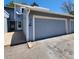 Charming townhouse featuring an attached garage, white trim, and well-kept curb appeal at 2746 S Kenton Ct, Aurora, CO 80014