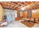 Unfinished basement, has storage and work space, and plumbing access at 1304 S Harlan St, Lakewood, CO 80232