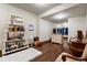 Large walk-in closet with custom shelving, natural light, and hardwood flooring at 9617 S Shadow Hill Cir, Lone Tree, CO 80124