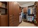 Walk-in closet with custom shelving, storage drawers, and hanging racks at 9617 S Shadow Hill Cir, Lone Tree, CO 80124