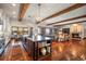 Open concept kitchen with an oversized island perfect for entertaining overlooking the dining and living spaces at 9617 S Shadow Hill Cir, Lone Tree, CO 80124