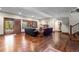 Spacious living room with hardwood floors, recessed lighting, and natural light from the outdoor view at 9617 S Shadow Hill Cir, Lone Tree, CO 80124