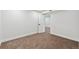 Bedroom featuring neutral carpet, and a large closet space at 2840 Cottonwood Dr, Denver, CO 80221