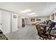 Finished basement with neutral carpeting, a musical instrument display and recessed ceiling lights at 2954 E 101St Ave, Thornton, CO 80229
